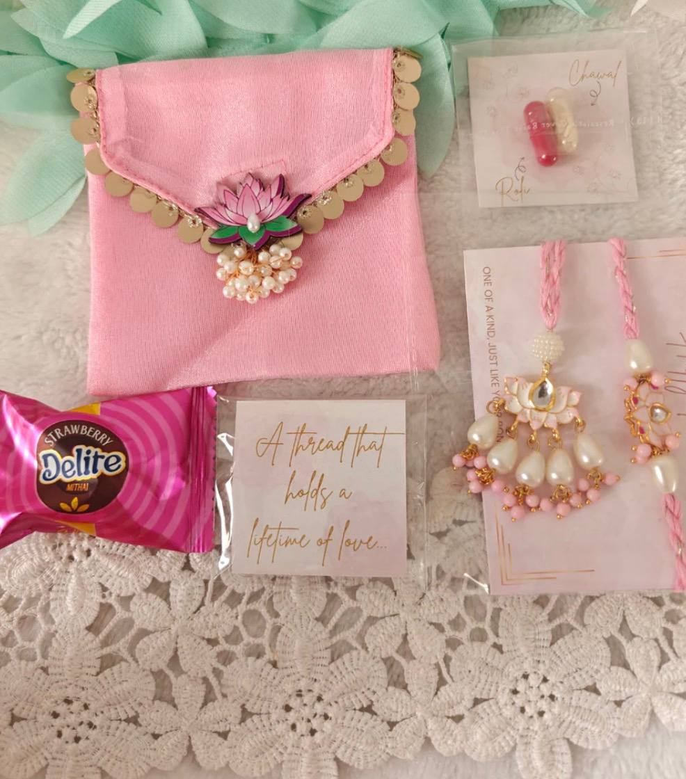Lotus pair rakhi with Roli Chawal and sweet
