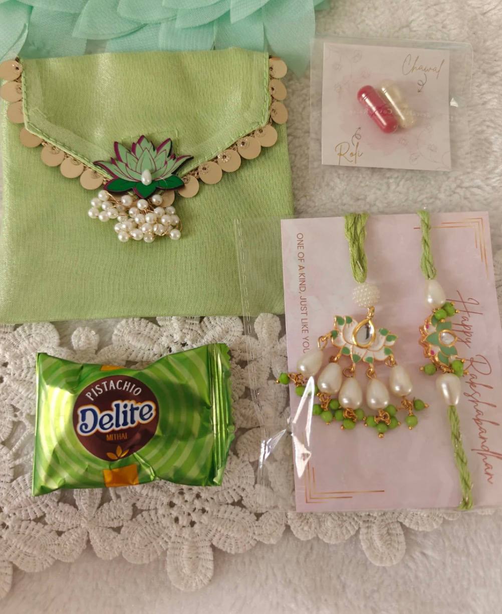 Lotus pair rakhi with Roli Chawal and sweet