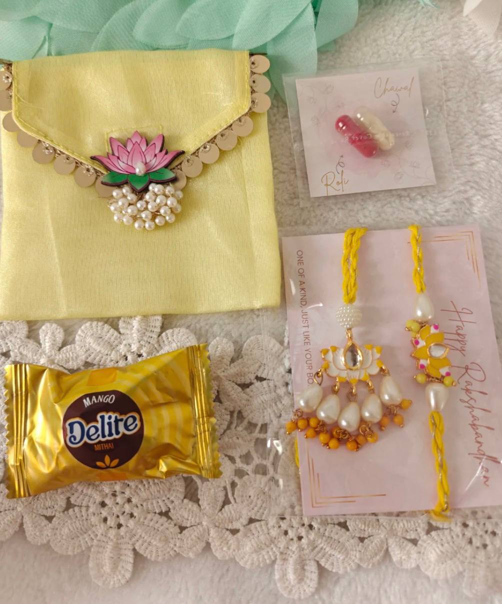Lotus pair rakhi with Roli Chawal and sweet